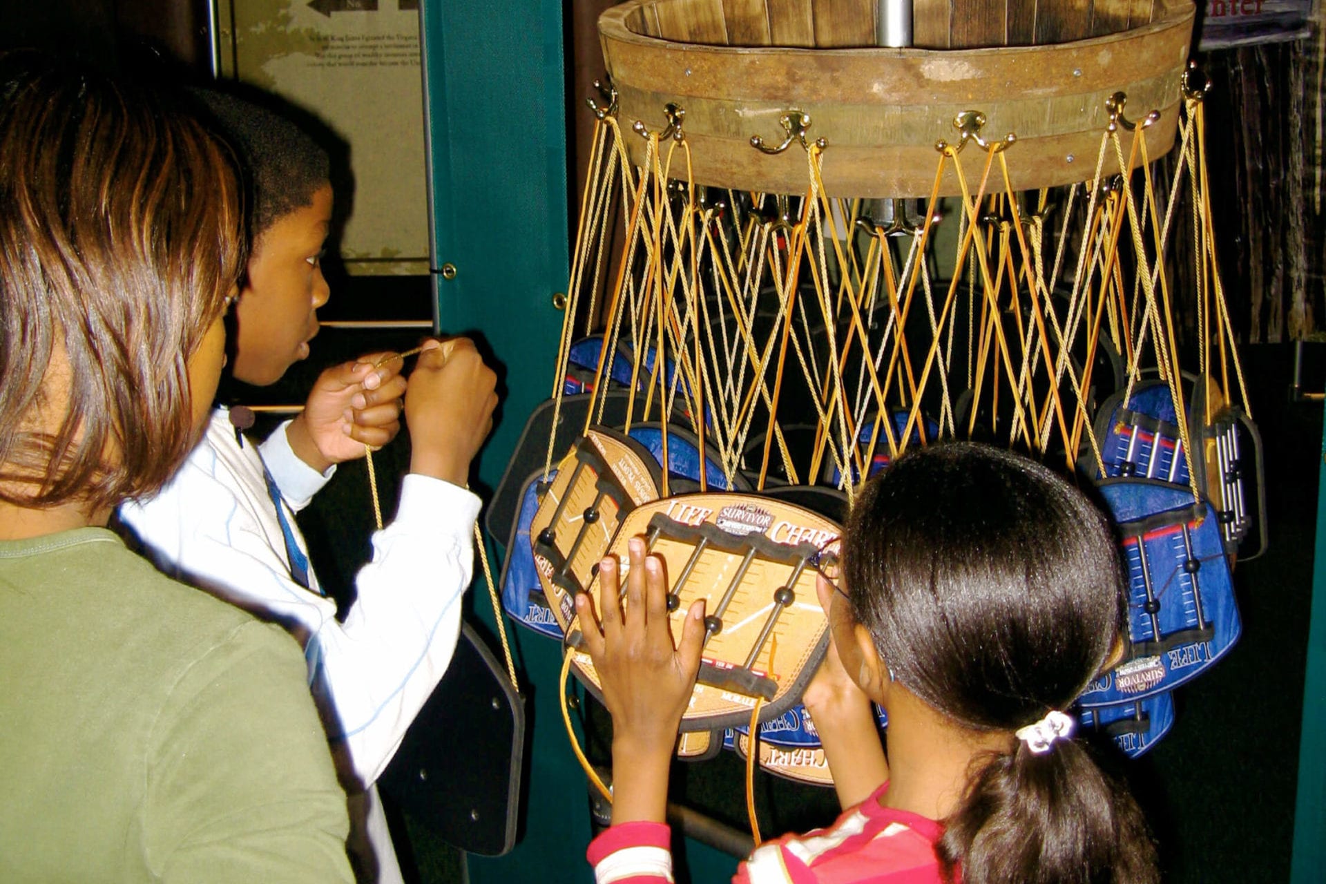 It keeps track of Life Charts drive the game-like experience of this maze. This unique tool lets visitors measure progress, encouraging them not only to complete the exhibit, but to repeat it multiple times as different colonists.